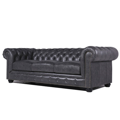 Sofá Chesterfield tradicional de cuero capitoné con diseño de cabeza de clavos