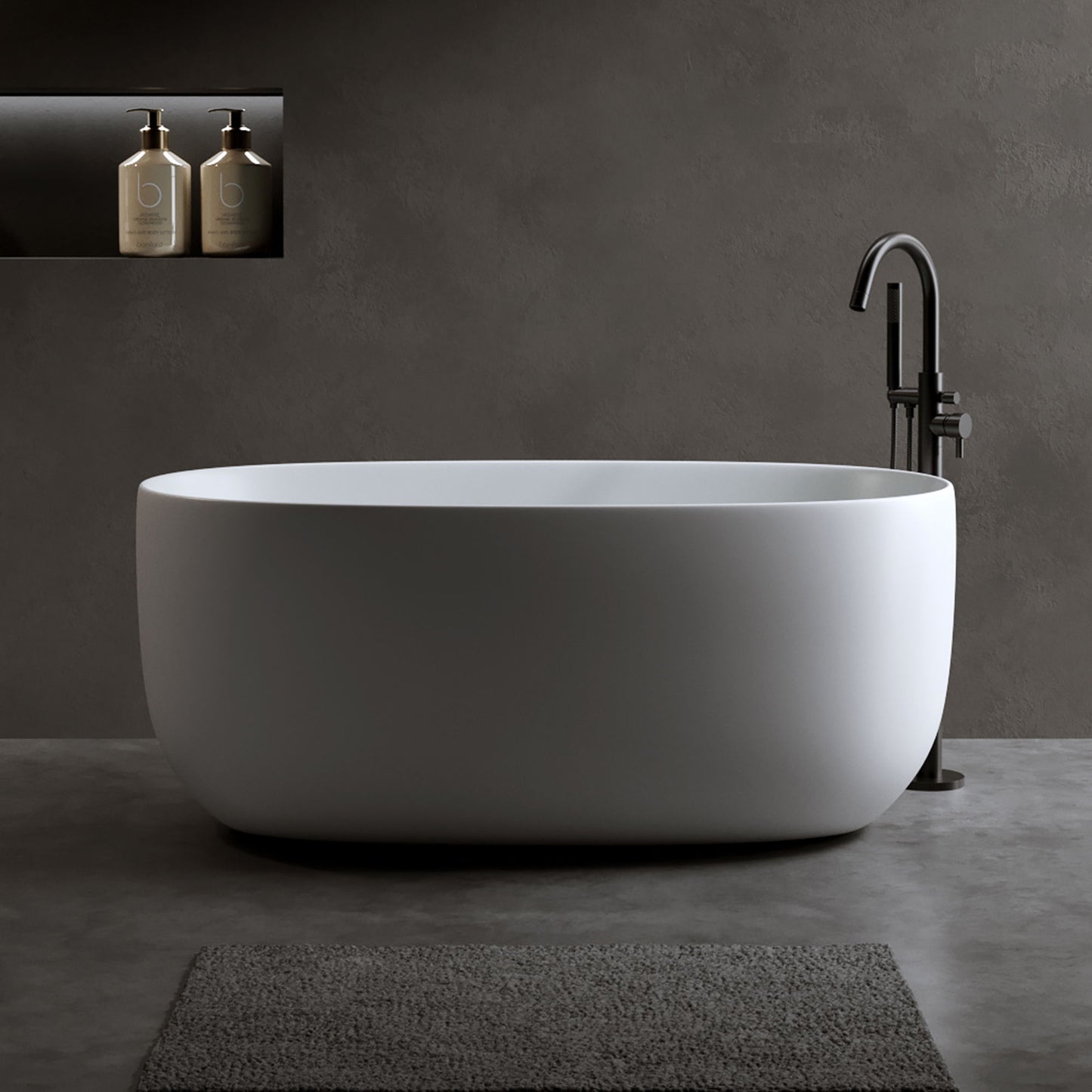 Bañera independiente de piedra de resina de superficie sólida. Diseño moderno con desagüe automático y rebosadero, ideal para hogares pequeños. Blanco mate.