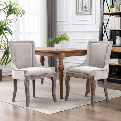 Silla de comedor Ultra Side, de tela gruesa, con patas de madera maciza en tonos neutros y tachuelas de bronce (juego de 2)