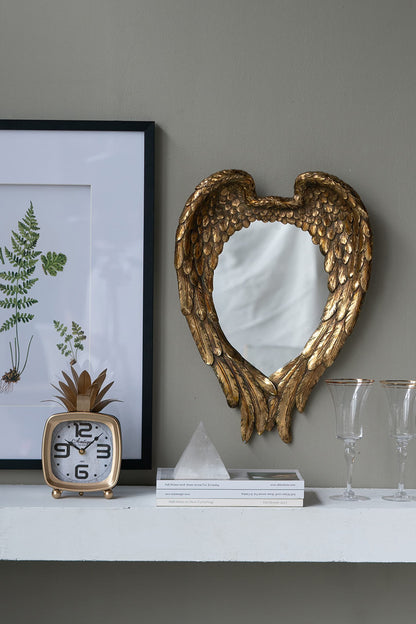 Espejo de pared con detalles de alas para sala de estar - Dorado