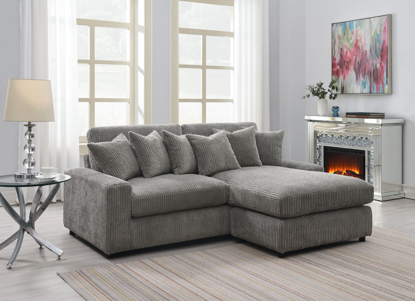 Tavia - Sofá seccional reversible con 6 cojines - Gris